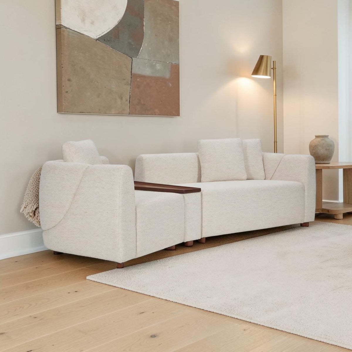 Homecrest Vero modular sofa in bone upholstery with teakwood tray and legs, arranged in a straight configuration.
