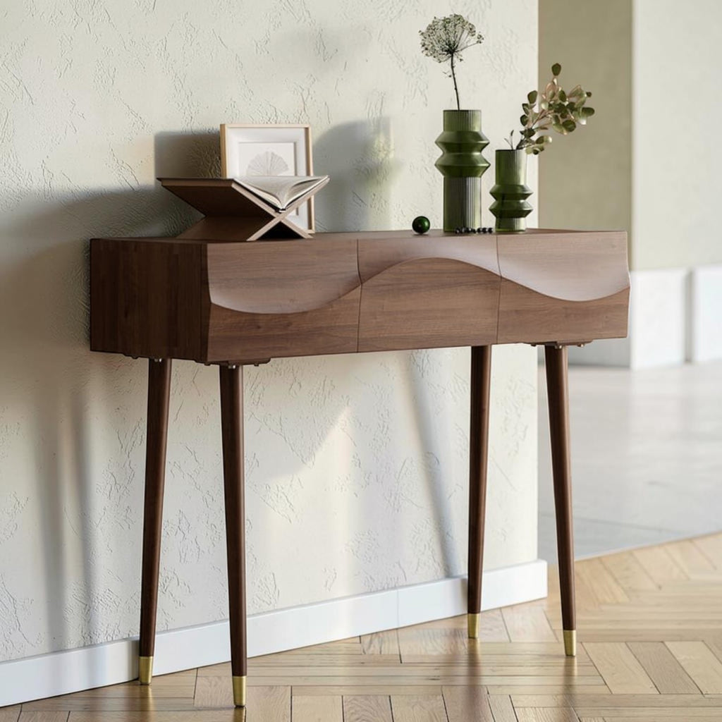 Homecrest Vessa acacia wood console table with a walnut finish and carved wave-patterned drawer fronts.