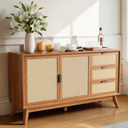Homecrest Whitlock sideboard in natural acacia wood with rattan door and drawer fronts on tall tapered legs.