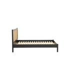 Homecrest Wicker solid mango wood bed frame with a natural rattan headboard, side view on white background