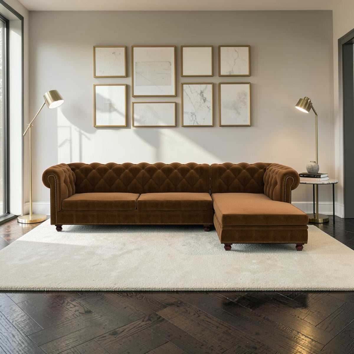Homecrest Wardour L-shaped brown velvet Chesterfield sofa with tufted back and brass nailhead trim in a living room.