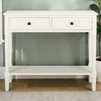 Homecrest Winsley white console table made of sheesham wood with two drawers, a lower shelf, and elegant carved legs.
