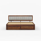 Homecrest Thurloe solid Sheesham wood bed featuring a tufted grey cushioned headboard and box storage base.