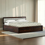 Homecrest Thurloe solid Sheesham wood bed featuring a grey cushioned headboard and dark brown wood frame